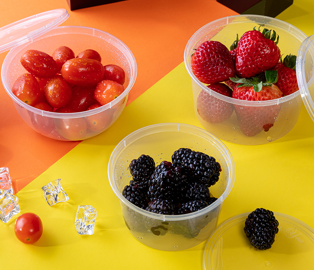 Photo of fruit in clear, circular plastic containers